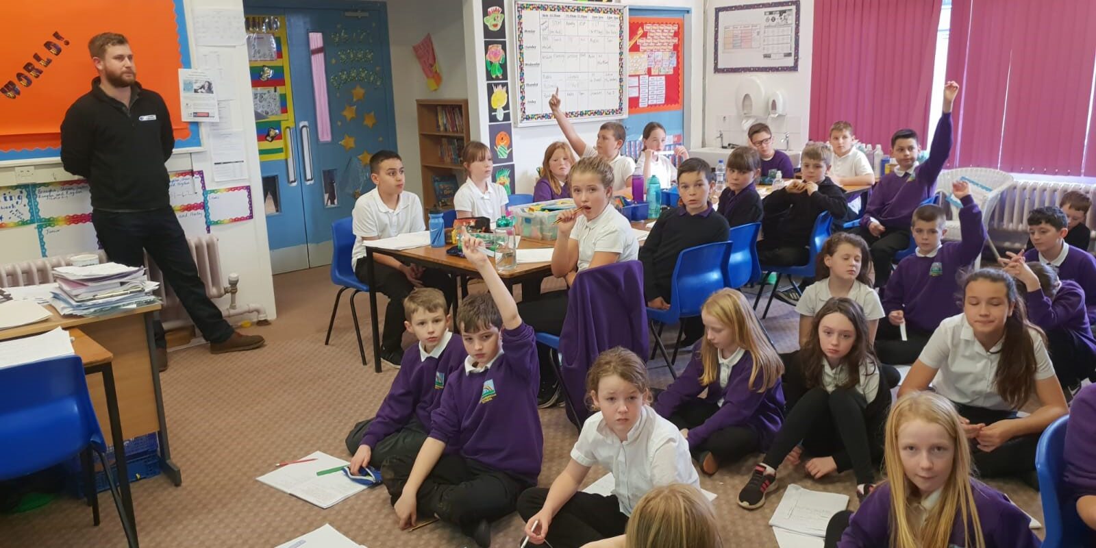 Director Joe Watson with pupils at Locharbriggs Primary School near Dumfries