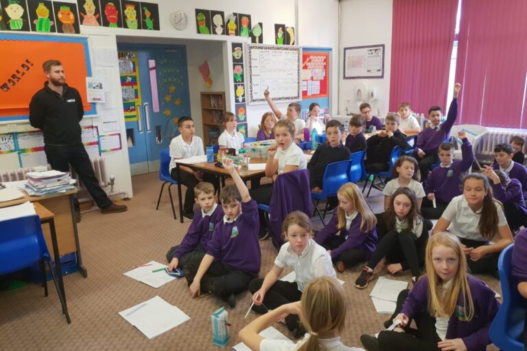 Director Joe Watson with pupils at Locharbriggs Primary School near Dumfries